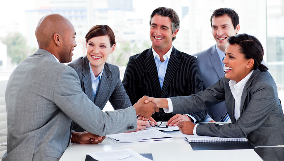 Multi-ethnic business people greeting each other in a meeting